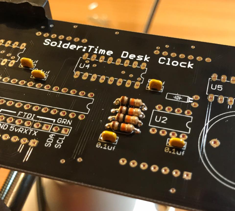 Capacitors and resistors installed on the clock PCB